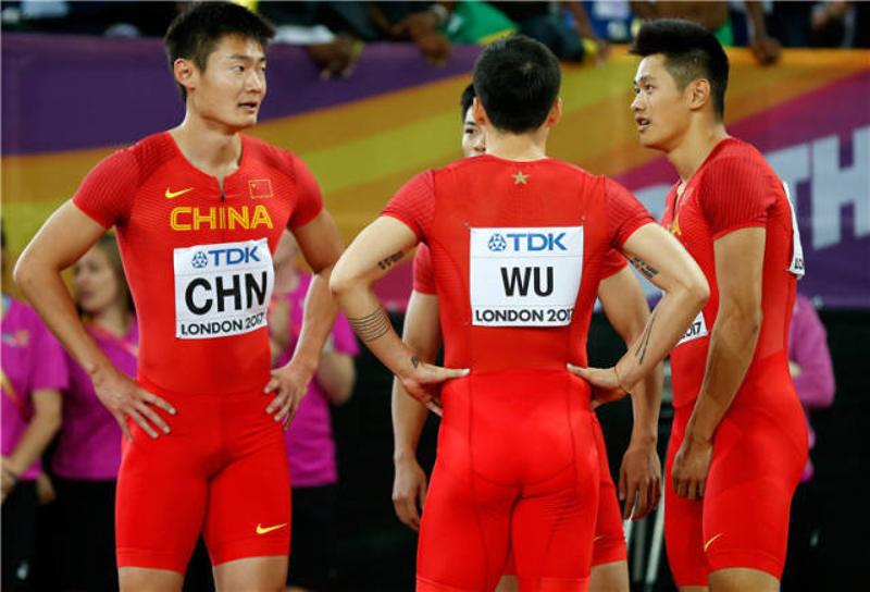 世锦赛上,中国队选手张培萌,苏炳添,吴智强与谢震业 王丽莉摄